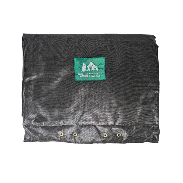 Thermal blanket for DB Choice grill by Green Mountain Grills, featuring a green logo patch and grommets for secure attachment.